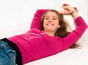 Girl Listening to Audiobooks