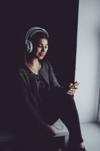 Girl Listening to Audiobooks 